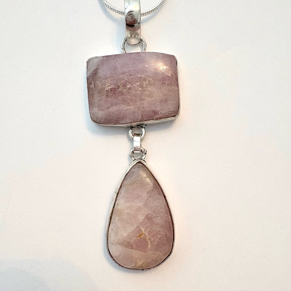 Gorgeous, 2 1/2 inch, 2 stone Pink Kunzite pendant on a silver chain.